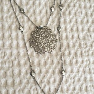 Silver multi strand necklace with large pendant